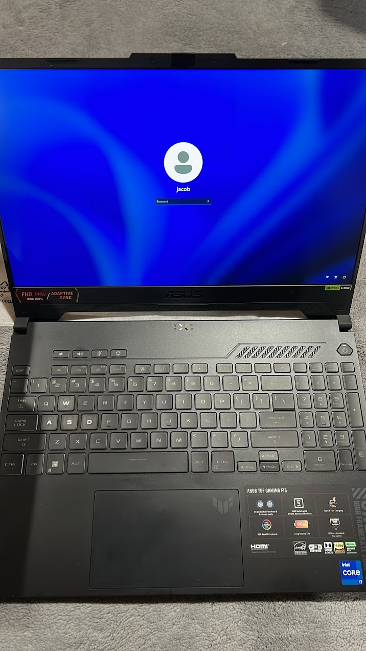 Powered-on ASUS TUF Gaming F15 laptop