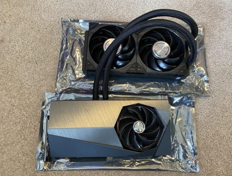 MSI GeForce RTX 4090 SUPRIM LIQUID X card with its liquid-cooling radiator